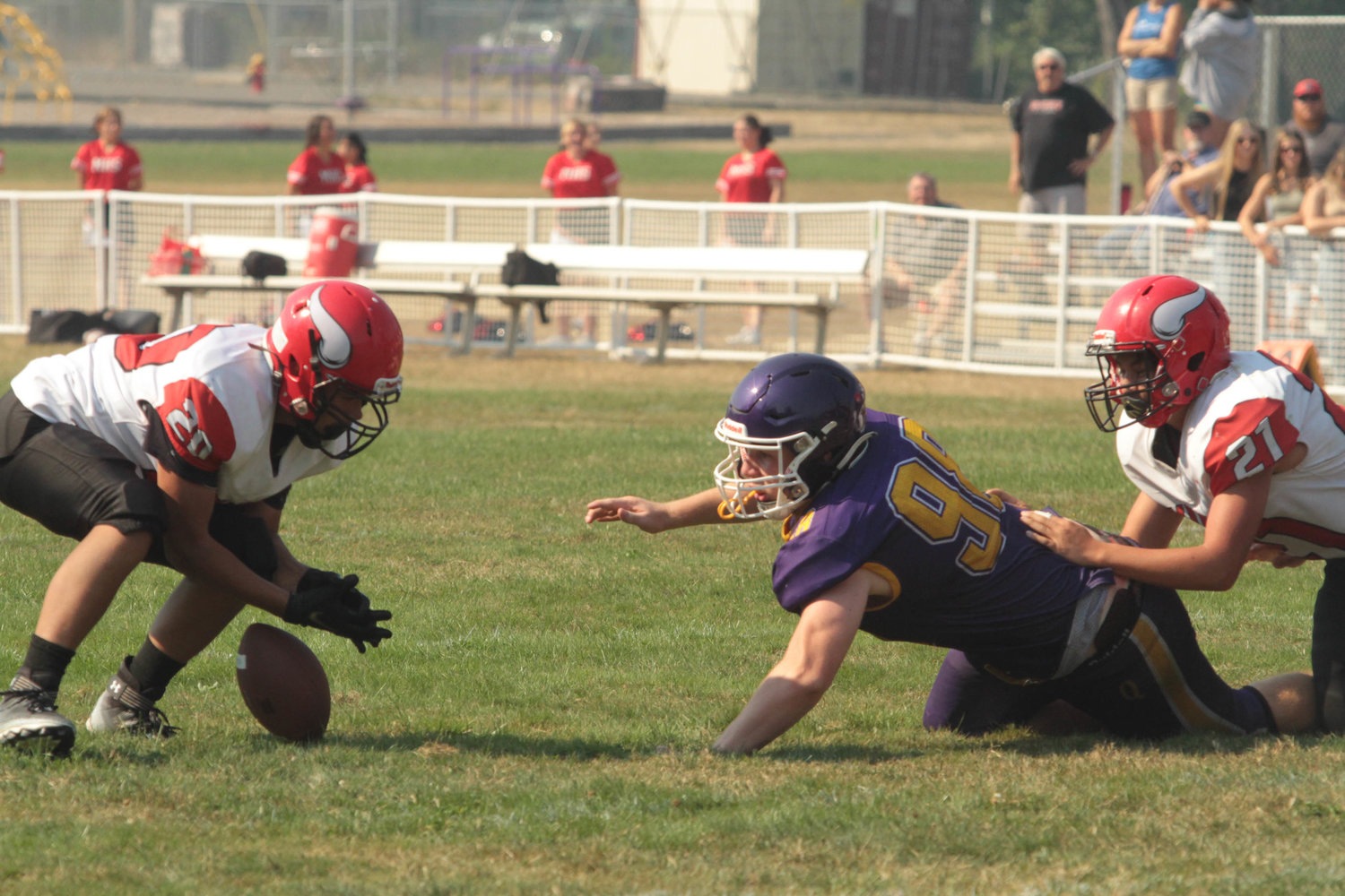 Maxx Budnek reaches out to recover a fumble in action against the Vikings.